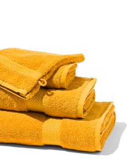 Bij zonsopgang beroemd schetsen handdoeken - zware kwaliteit okergeel - HEMA